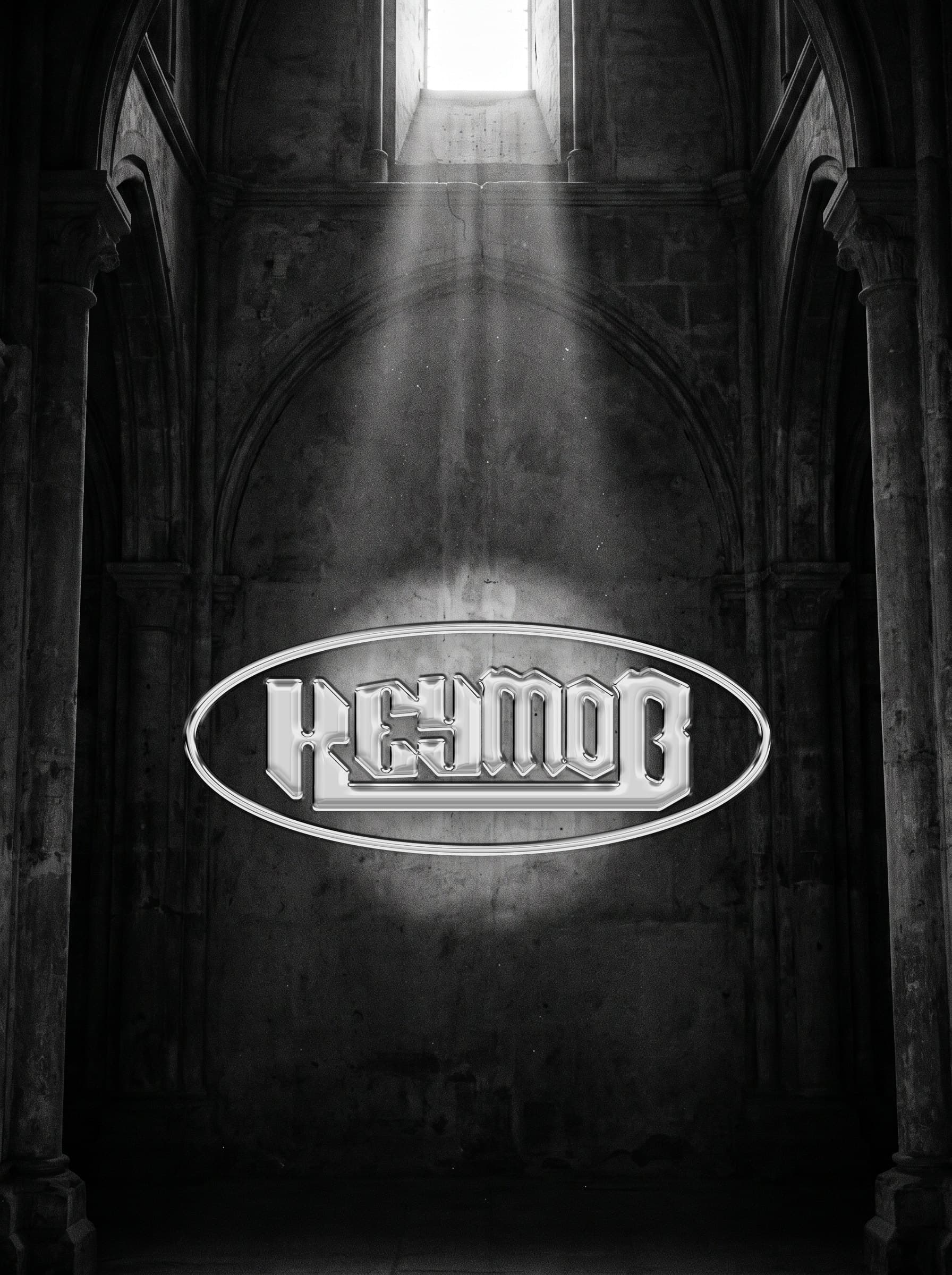 The chrome KEYMOB logo inside its oval, lit by a single beam in a gothic stone hall